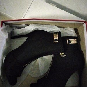 Heeled toe booties by Guess